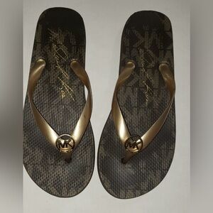 Gold Micheal Kors flip flop; women’s